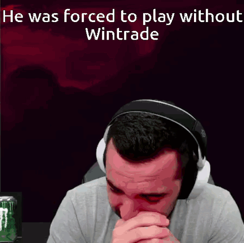 A Man Wearing Headphones With The Words He Was Forced To Play Without Wintrade GIF