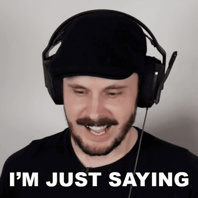 A Man Wearing Headphones With The Words I 'M Just Saying On The Bottom GIF