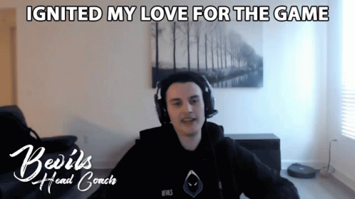 A Man Wearing Headphones With The Words Ignited My Love For The Game GIF