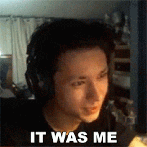 A Man Wearing Headphones With The Words It Was Me On His Face GIF
