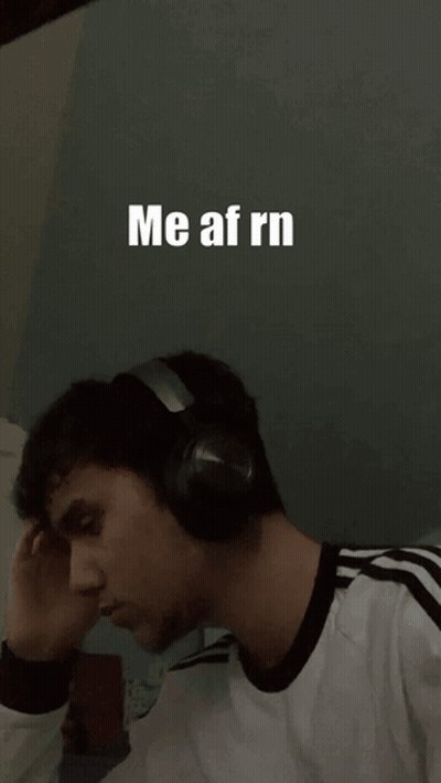 A Man Wearing Headphones With The Words Me Af Rn On The Bottom GIF