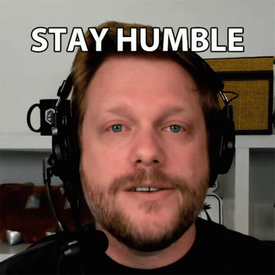 A Man Wearing Headphones With The Words Stay Humble Written Above Him GIF