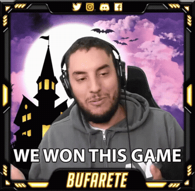A Man Wearing Headphones With The Words " We Won This Game " Below Him GIF