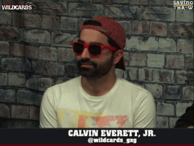 A Man Wearing Red Sunglasses And A Red Hat Is Named Calvin Everett Jr. GIF