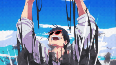 A Man Wearing Red Sunglasses Is Covered In A Black Substance GIF