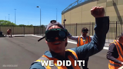 A Man Wearing Safety Vests And Goggles Says " We Did It " GIF