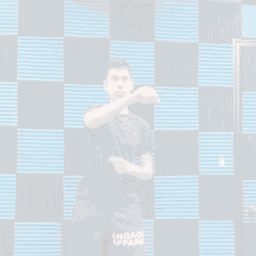 A Man Wearing Shorts That Say Engage Apparel Is Dancing GIF