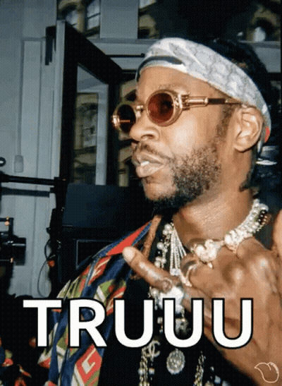 A Man Wearing Sunglasses And A Bandana Has The Word Truuu Written On His Face GIF