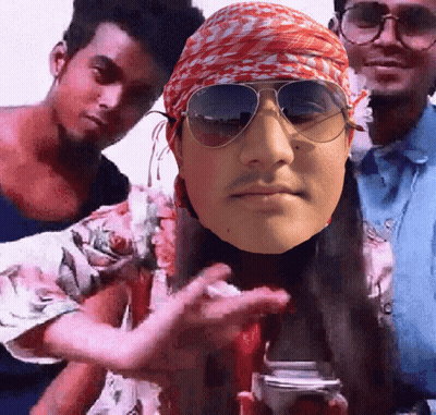 A Man Wearing Sunglasses And A Bandana Holds A Camera GIF