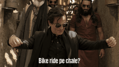 A Man Wearing Sunglasses And A Black Jacket With The Words Bike Ride Pe Chale GIF