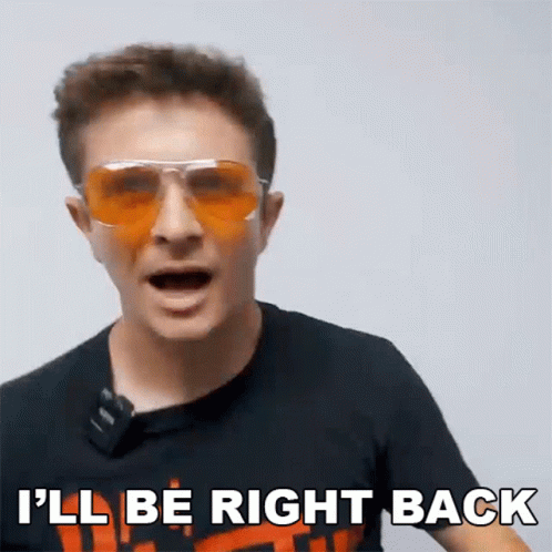 A Man Wearing Sunglasses And A Black Shirt Is Saying I 'Ll Be Right Back GIF