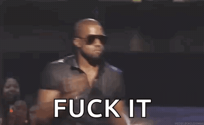 A Man Wearing Sunglasses And A Black Shirt Is Standing In Front Of A Microphone And Saying `` Fuck It '' . GIF