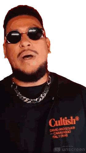 A Man Wearing Sunglasses And A Black Shirt That Says Cultish On It Sticker