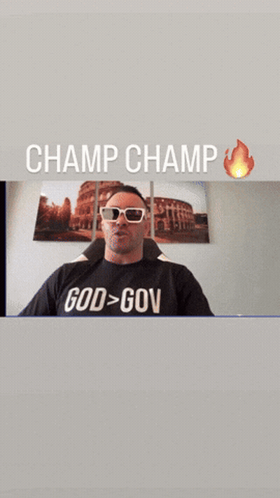 A Man Wearing Sunglasses And A Black Shirt That Says God Gov GIF