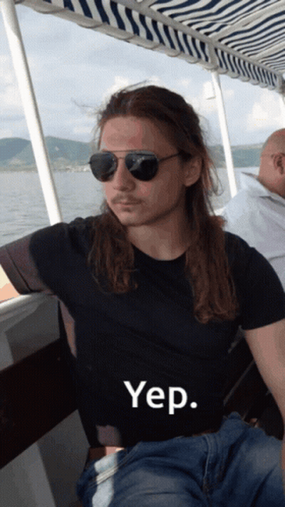 A Man Wearing Sunglasses And A Black Shirt With The Word Yep On The Front GIF
