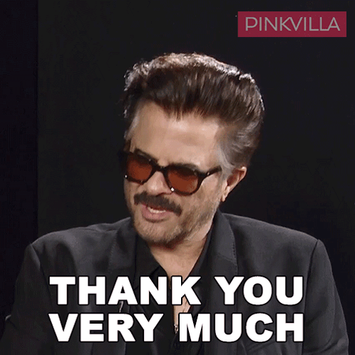 A Man Wearing Sunglasses And A Black Suit Says Thank You Very Much GIF