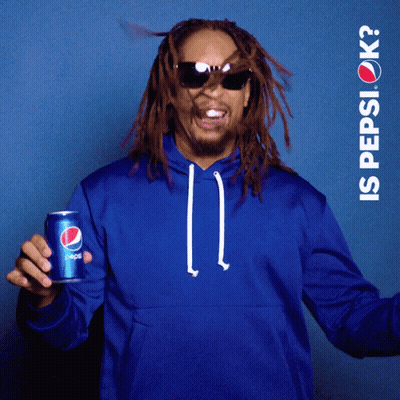 A Man Wearing Sunglasses And A Blue Hoodie Holds A Can Of Pepsi GIF