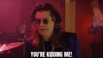 A Man Wearing Sunglasses And A Blue Jacket Says You 'Re Kidding Me GIF