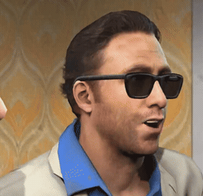 A Man Wearing Sunglasses And A Blue Shirt Is Making A Funny Face GIF