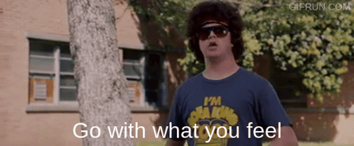 A Man Wearing Sunglasses And A Blue Shirt That Says I 'M A King GIF