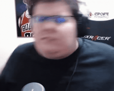 A Man Wearing Sunglasses And A Bulls Jersey Behind Him GIF