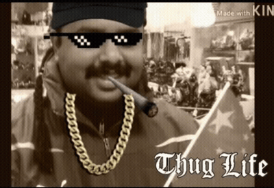 A Man Wearing Sunglasses And A Chain Has The Word Thug Life On The Bottom Right GIF