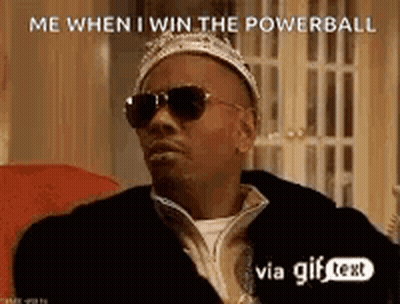 A Man Wearing Sunglasses And A Crown Is Sitting On A Couch With A Gif Text . GIF