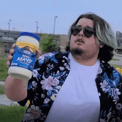 A Man Wearing Sunglasses And A Floral Shirt Is Holding A Jar Of Mayonnaise . GIF