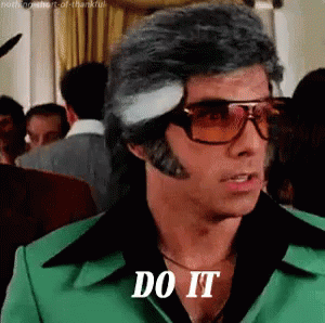 A Man Wearing Sunglasses And A Green Suit Says `` Do It '' . GIF