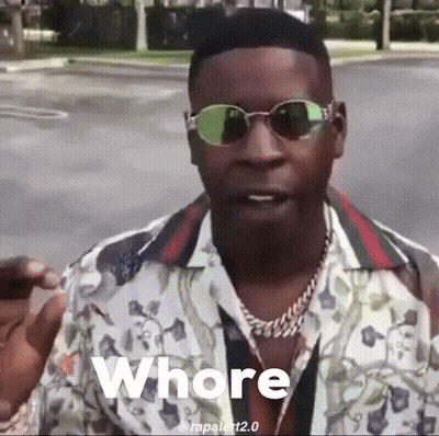 A Man Wearing Sunglasses And A Gucci Shirt Says Whore GIF