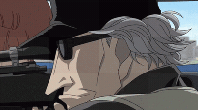 A Man Wearing Sunglasses And A Hat Is Holding A Rifle GIF
