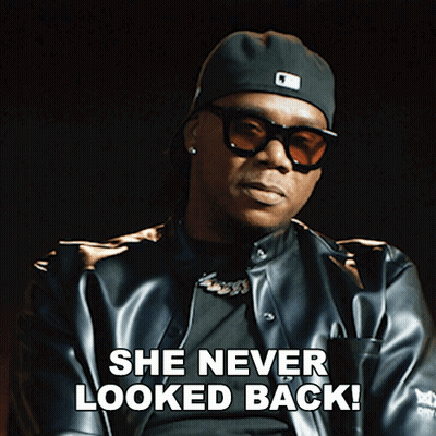 A Man Wearing Sunglasses And A Hat Says " She Never Looked Back " GIF