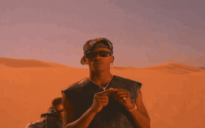 A Man Wearing Sunglasses And A Hat That Says ' Chicago Bulls ' On It GIF