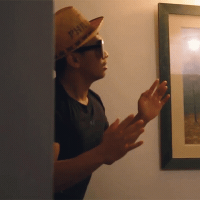 A Man Wearing Sunglasses And A Hat That Says Phil On It GIF