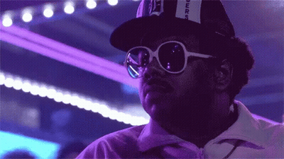 A Man Wearing Sunglasses And A Hat That Says ' Supreme ' On It GIF