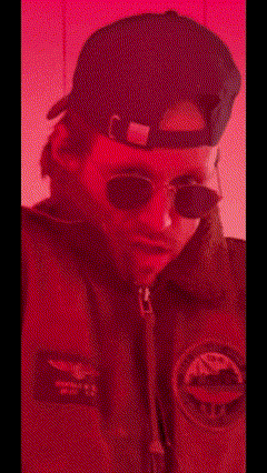 A Man Wearing Sunglasses And A Hat With The Words " Suupuaah Tight " On The Bottom GIF