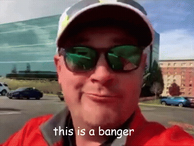 A Man Wearing Sunglasses And A Hat With The Words This Is A Banger Below Him GIF