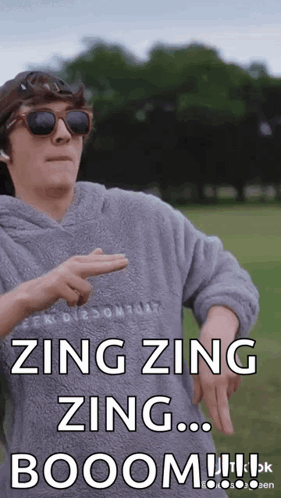 A Man Wearing Sunglasses And A Hoodie Says Zing Zing Zing ... Booom ! GIF