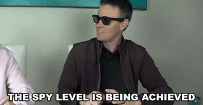 A Man Wearing Sunglasses And A Jacket Says " The Spy Level Is Being Achieved " GIF