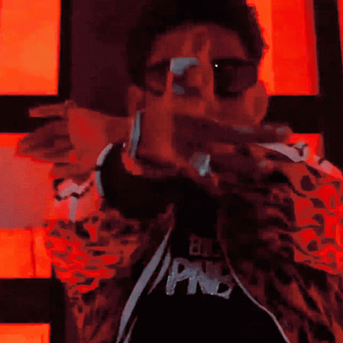 A Man Wearing Sunglasses And A Jacket That Says Pnc GIF