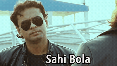 A Man Wearing Sunglasses And A Leather Jacket Has Sahi Bola Written Below Him GIF