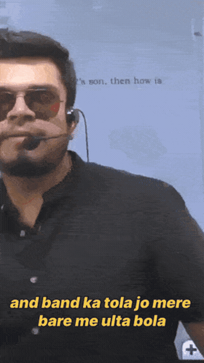 A Man Wearing Sunglasses And A Microphone Says " I 'M Son Then How Is " GIF