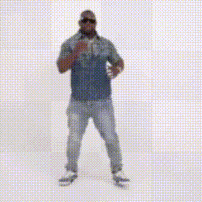 A Man Wearing Sunglasses And A Necklace Is Dancing . GIF
