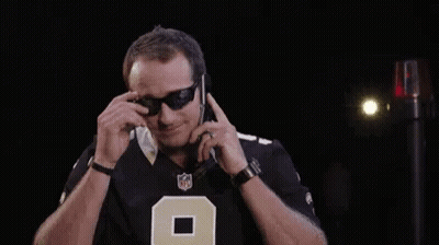 A Man Wearing Sunglasses And A Nfl Jersey With The Number 9 On It GIF
