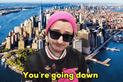 A Man Wearing Sunglasses And A Pink Beanie Says You 'Re Going Down GIF