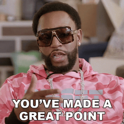 A Man Wearing Sunglasses And A Pink Camo Shirt Says You 'Ve Made A Great Point GIF