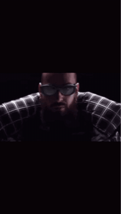 A Man Wearing Sunglasses And A Plaid Shirt With The Words Hey Le Brother On The Bottom GIF