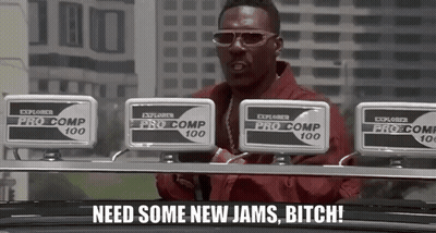A Man Wearing Sunglasses And A Red Jacket Says " Need Some New Jams Bitch ! " GIF