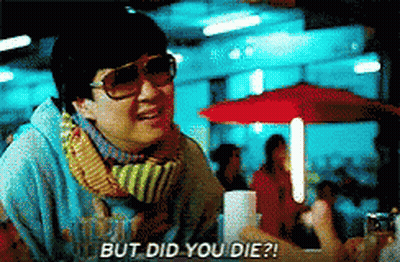 A Man Wearing Sunglasses And A Scarf Is Saying But Did You Die GIF