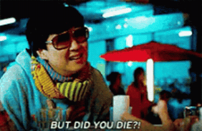 A Man Wearing Sunglasses And A Scarf Is Saying But Did You Die GIF